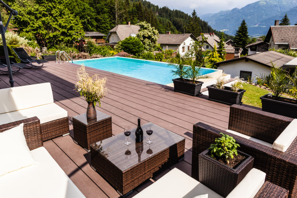 Modern landscape that includes a wooden deck